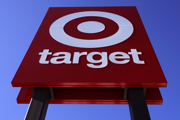 FILE - The bullseye logo on a sign outside the Target store in Quincy, Mass., Monday, Feb. 28, 2022. Target says it will stop selling a product dedicated to Civil Rights icons after a now-viral TikTok spotlighted some significant errors. (AP Photo/Charles Krupa, File)