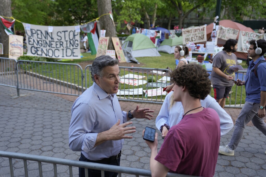 Republican U.S. Senate candidate Dave McCormick speaks outside a Gaza Solidarity Encampment at the University of Pennsylvania in Philadelphia, Wednesday, May 1, 2024. (AP Photo/Matt Rourke)