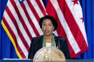 FILE - Washington Mayor Muriel Bowser speaks at a news conference March 15, 2021, in Washington. The District of Columbia will lift its indoor mask requirement starting next week, as local COVID infection cases continue to trend downward. Starting Monday, Nov. 22, masks will no longer be required in many indoor spaces. (AP Photo/Andrew Harnik, File)