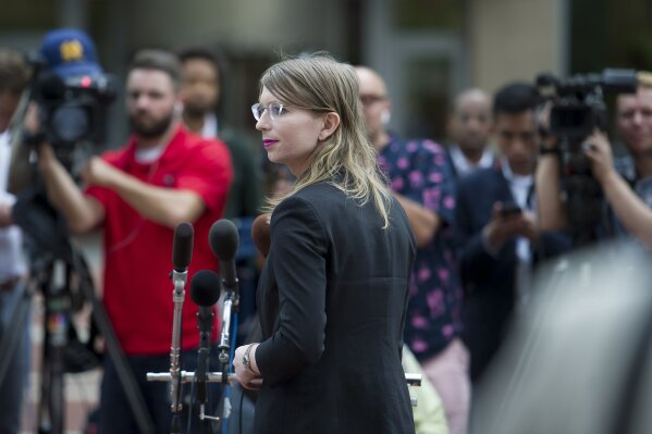 
              Former Army intelligence analyst Chelsea Manning speaks with reporters, after arriving at the federal courthouse in Alexandria, Va., Thursday, May 16, 2019. Manning spoke about the federal court’s continued attempts to compel her to testify in front of a grand jury. (AP Photo/Cliff Owen)
            