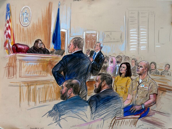 FILE - This courtroom sketch depicts Marine Maj. Joshua Mast and his wife, Stephanie, during a Circuit Court hearing before Judge Claude V. Worrell Jr., Thursday, March 30, 2023, in Charlottesville, Va. The Masts adopted an Afghan girl who was orphaned in a 2019 raid. They insist her parents were foreign fighters and the child is “stateless.” But villagers in Afghanistan say her father was a local farmer, not a militant, and he, his wife and five of their children were killed in the attack. (Dana Verkouteren via AP)