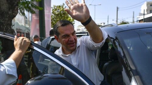 FILE - Opposition leader Alexis Tsipras, head of the left-wing Syriza party, leaves after voting at a polling station in Athens, Greece, Sunday, June 25, 2023. Greece’s left-wing opposition leader, Alexis Tsipras has announced his decision to step down after a crushing election defeat. Tsipras made the announcement on Thursday, June 29, 2023. The 48 year-old politician served as Greece’s prime minister from 2015 to 2019 during politically tumultuous years as the country struggled to remain in the euro zone and end a series of international bailouts. (AP Photo/Michael Varaklas, File)