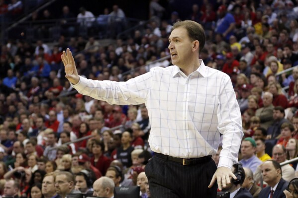 FILE - Then-Albany head coach Will Brown yells at his team in the second half of an NCAA tournament college basketball game against Oklahoma in the Round of 64 in Columbus, Ohio, Friday, March 20, 2015. The coaching job Will Brown has done in his first year at The College of Saint Rose is impressive. He won’t be at Saint Rose next season. Nobody will be. There is no next season. (AP Photo/Paul Vernon, File)