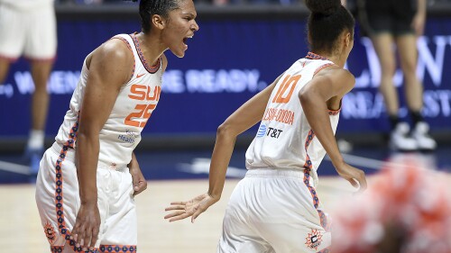 Connecticut Sun's Alyssa Thomas (25) celebrates a basket against the New York Liberty with Olivia Nelson-Ododa (10) during the first half of a WNBA basketball game Tuesday, June 27, 2023, in Uncasville, Conn. (Sarah Gordon/The Day via AP)