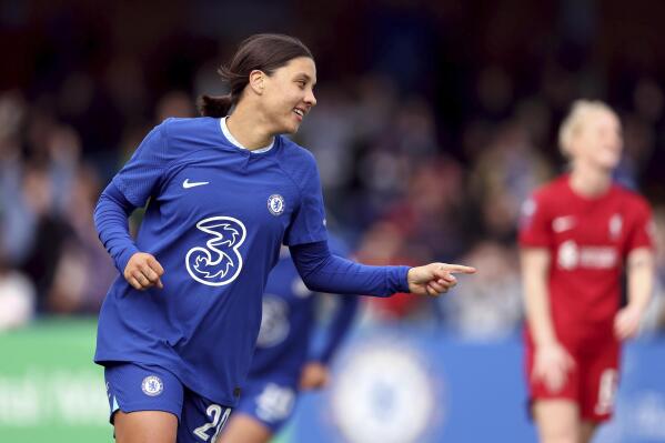 Chelsea's Sam Kerr celebrates scoring during the Women's FA Cup fourth round soccer match between Chelsea and Liverpool at Kingsmeadow, London, Sunday Jan. 29, 2023. (Steven Paston/PA via AP)