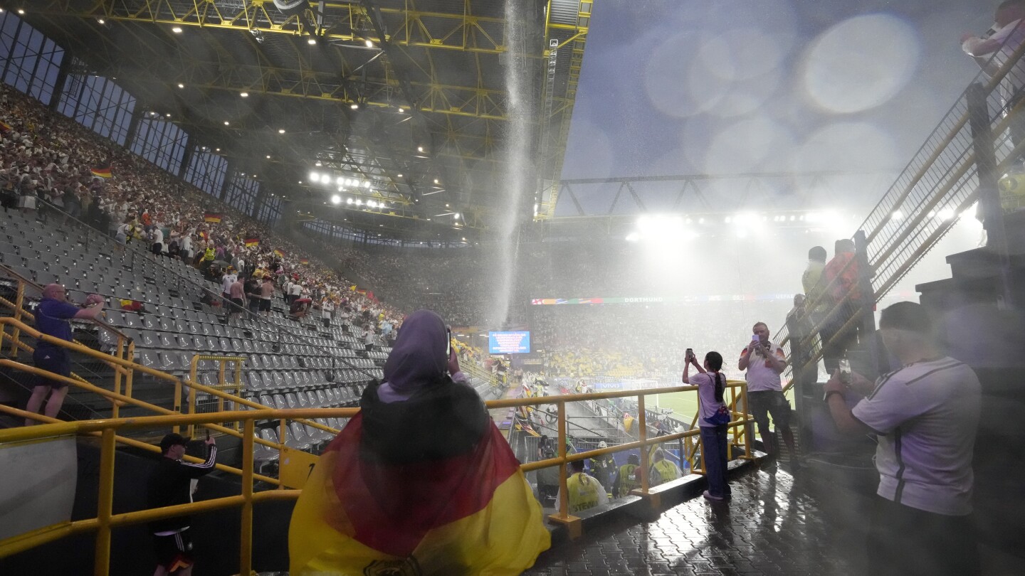 Germany’s match with Denmark resumes at Euro 2024 after thunderstorms