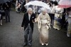 FILE - In this Nov. 9, 2018, file photo, Japan's Emperor Akihito, left, and Empress Michiko, right, greet the guests during the autumn garden party at the Akasaka Palace imperial garden in Tokyo. Akihito abdicated in 2019 at the age of 85, citing age and declining health in his decision to hand over the throne to his son Emperor Naruhito. It was Japan's first abdication in two centuries. (AP Photo/Eugene Hoshiko, File)