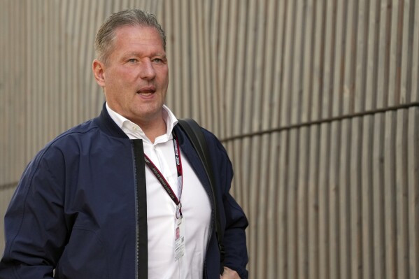 FILE - Jos Verstappen, father of Red Bull driver Max Verstappen of the Netherlands arrives prior to the first free practice for the Austrian Formula One Grand Prix at the Red Bull Ring racetrack in Spielberg, Austria, Friday, July 8, 2022. The Red Bull Formula One team will “explode” if Christian Horner stays on as team principal, according to Jos Verstappen, the father of three-time F1 champion Max Verstappen. The F1 spotlight has been almost entirely on Horner in the days leading up to the new season, over his alleged behavior towards a team employee. (AP Photo/Matthias Schrader, File)