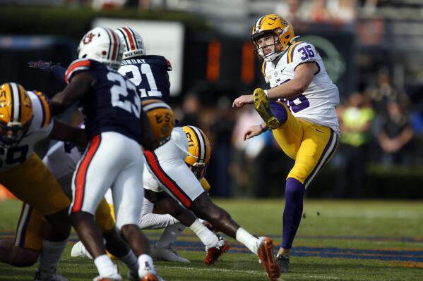 FILE - LSU kicker Cade York (36) boots a field goal during the second quarter of an NCAA college football game against Auburn, on Oct. 31, 2020, in Auburn, Ala. The Cleveland Browns selected York in the fourth round (124th overall) of the NFL draft. (AP Photo/Butch Dill, File)