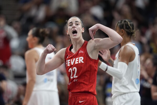 Caitlin Clark scores 29 to help Fever fend off Mercury rally in 98-89 win  before sellout crowd | AP News