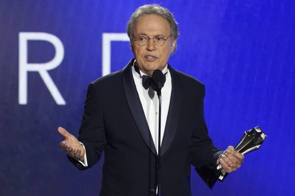 FILE - Billy Crystal accepts the lifetime achievement award at the 27th annual Critics Choice Awards on March 13, 2022, at the Fairmont Century Plaza Hotel in Los Angeles. (AP Photo/Chris Pizzello, File)