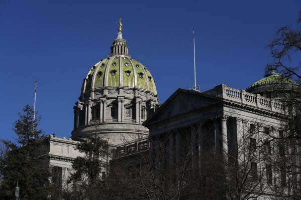 FILE - The Pennsylvania Capitol is seen, Feb. 6, 2024, in Harrisburg, Pa. Pennsylvania lawmakers will return to session Monday, June 3, as they begin a four-week countdown to the state government's new fiscal year, as Democratic Gov. Josh Shapiro and Republican lawmakers offer competing visions for how to use a massive surplus. (AP Photo/Matt Rourke, File)