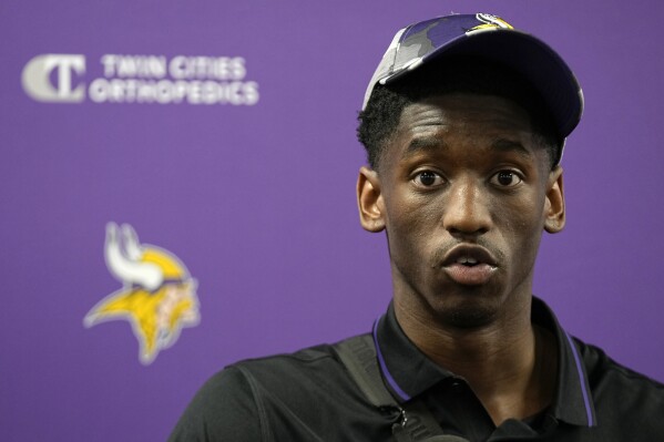 FILE - Minnesota Vikings first-round draft pick Jordan Addison speaks to the media during an NFL football press conference in Eagan, Minn., Friday, April 28, 2023. Addison was cited early Thursday, July 20, for speeding and reckless driving, after a state trooper clocked him at 140 mph in his sports car in a 55 mph zone. The Minnesota State Patrol said Addison was pulled over without resistance in a Lamborghini Urus at 3:07 a.m. (AP Photo/Abbie Parr, File)