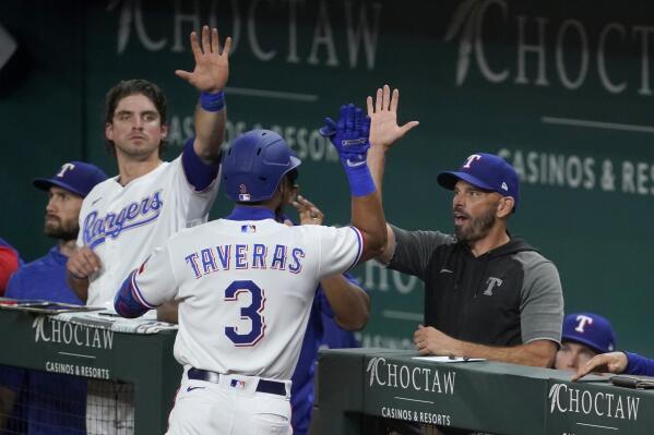 Leody Taveras and Nathaniel Lowe of the Texas Rangers celebrate an