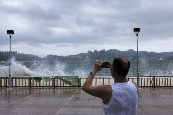 Schools and stock market closed as Hong Kong braces for Typhoon Talim | AP  News
