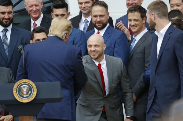 President Donald Trump shakes hands with Boston Red Sox outfielder J. D.  Martinez as he welcomes the 2018 World Series Champions Boston Red Sox,  during a ceremony honoring them at the White