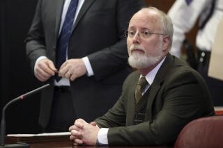FILE - Robert Hadden appears in Manhattan Supreme Court in New York, Feb. 23, 2016. Columbia University and New York-Presbyterian Hospital have announced a settlement with 79 women who say they were sexually abused by Hadden, a former New York gynecologist. (Alec Tabak via AP, File)