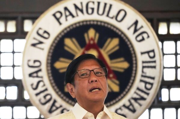 Philippine President Ferdinand Marcos Jr. speaks during the presentation of the newly enacted laws to stakeholders at the Malacanang Presidential Palace in Manila, Philippines Thursday, May 22, 2025. (AP Photo/Aaron Favila)