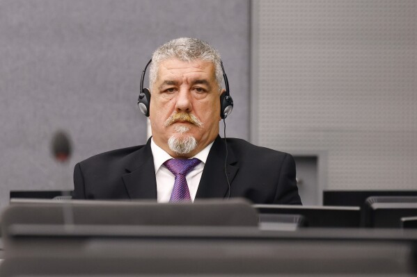 Former Kosovo Liberation Army (KLA) member Pjeter Shala attends his trial as judges at the Kosovo Specialist Chambers will hand down a judgment in The Hague, Netherlands, Tuesday, July 16 2024. (Piroschka van de Wouw/Pool photo via AP)