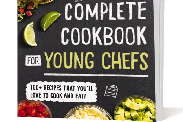 
              This image provided by America's Test Kitchen in February 2019 shows the cover for “The Complete Cookbook for Young Chefs.” It includes a recipe for Buttermilk Drop Biscuits. (America's Test Kitchen via AP)
            