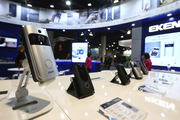 FILE - An EKEN doorbell camera, along with other models, are shown on display at CES International, Jan. 10, 2019, in Las Vegas. Some doorbell cameras sold by Amazon and other online retailers have security flaws that could allow bad actors to view footage from the devices or control them completely, according to an investigation published Thursday, Feb. 29, 2024, by Consumer Reports. (AP Photo/Ross D. Franklin, File)