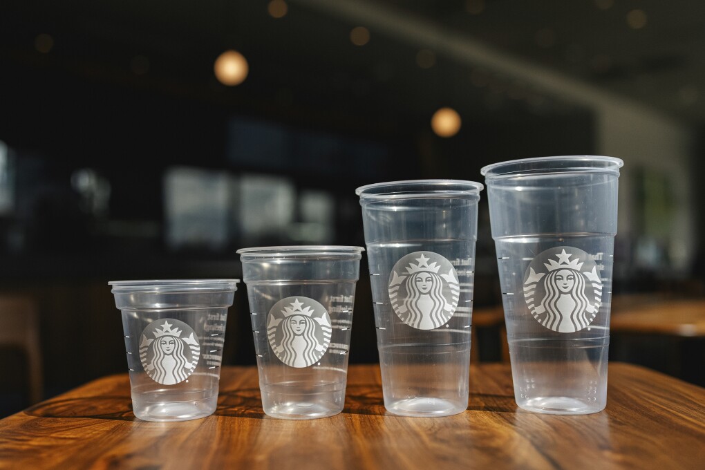 This photo provided by Starbucks shows a new version of the company's cold cup which is said to be made with up to 20% less plastic. The introduction of the cups will be announced on Thursday, April 18, 2024. (Starbucks via AP)