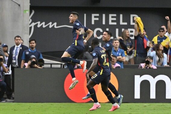  Ecuador players celebrate after an own goal from Jamaica's Kasey Palmer during a Copa America Group B soccer match in Las Vegas, Wednesday, June 26, 2024. (AP Photo/David Becker)