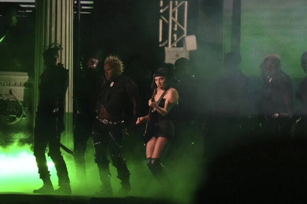 Lady Gaga performs during her free concert on Copacabana Beach in Rio de Janeiro, Saturday, May 3, 2025. (AP Photo/Silvia Izquierdo)