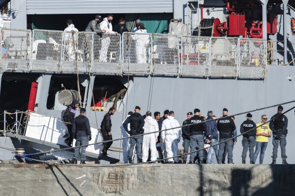 Migrants disembark from the Italian navy ship Libra at the port of Shengjin, northwestern Albania, Friday, Nov. 8, 2024. (AP Photo/Vlasov Sulajm, File)
