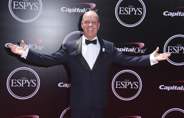 FILE - Scott Hamilton arrives at the ESPY Awards at the Microsoft Theater on Wednesday, July 13, 2016, in Los Angeles. Scott Hamilton can scarcely believe that it has been four decades since he stood atop the Olympic podium in Sarajevo. To commemorate the anniversary of that night at Zetra Olympic Hall, the American figure skating icon is planning to reunite with the rest of the podium 鈥� Canadian silver medalist Brian Orser and bronze medalist Josef Sabovcik of Czechoslovakia 鈥� for a series of events to raise funds for his foundation and the Memorial Sloan Kettering Cancer Center. (Photo by Jordan Strauss/Invision/AP, File)