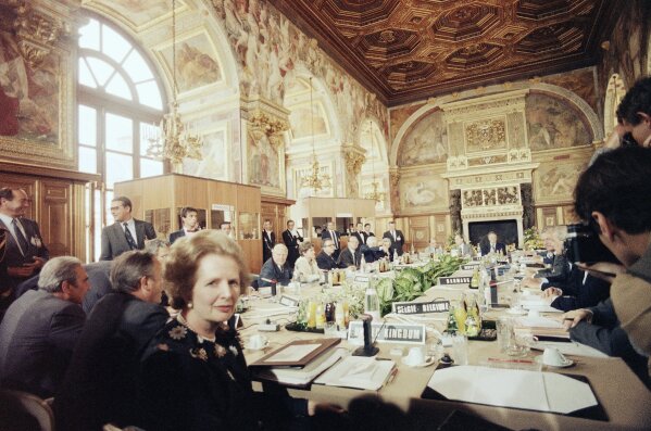 FILE - In this June 25, 1984 file photo, British Prime Minister Margaret Thatcher faces the camera at a summit of European leaders in Fontainebleau, France. At the summit, Thatcher got a financial rebate for Britain. Thatcher's 11-year premiership became increasingly dominated by her opposition to what later became known as the European Union. On Jan. 31, 2020, Britain is scheduled to leave the EU after 47 years. (AP Photo/File)