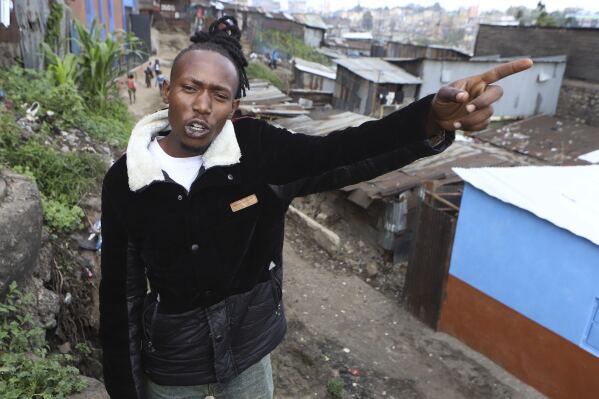 Joseph Kariaga who once lived the "gangster life" speaks during an interview with the associated press in the Mathare informal settlement of the capital Nairobi, Kenya Saturday, April 5, 2025. (AP Photo/Andrew Kasuku)