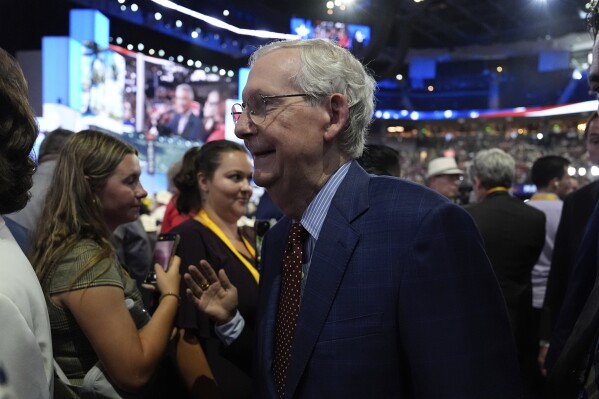 Senate Majority Leader Mitch McConnell of Ky., walks the convention floor during the Republican National Convention Monday, July 15, 2024, in Milwaukee. (AP Photo/Julia Nikhinson)