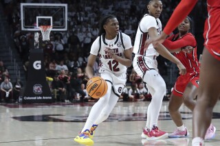 South Carolina guard MiLaysia Fulwiley (12) looks for a path to the basket during the second half of an NCAA college basketball game against Georgia, Sunday, Feb. 18, 2024, in Columbia, S.C. (AP Photo/Artie Walker Jr.)