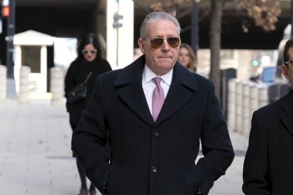 Charles McGonigal, former special agent in charge of the FBI's counterintelligence division in New York, arrives at the federal courthouse in Washington, Friday, Feb. 16, 2024. (AP Photo/Jose Luis Magana)