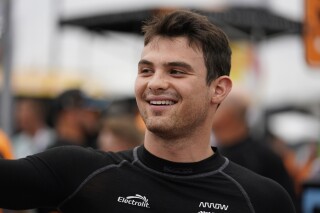 FILE - Pato O'Ward prepares before the start of an IndyCar auto race at World Wide Technology Raceway, on Aug. 27, 2023, in Madison, Ill. Formula One team McLaren signed its IndyCar racer Pato O’Ward on Thursday, Nov. 23, 2023, as a reserve driver for next season. (AP Photo/Jeff Roberson)