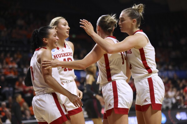 Nebraska's Darian White, Alexis Markowski, Callin Hake and Jaz Shelley, from left, react to a call in the tema's favor during the second half of a first-round college basketball game against Texas A&M in the women's NCAA Tournament in Corvallis, Ore., Friday, March 22, 2024. Nebraska won 61-59. (AP Photo/Amanda Loman)