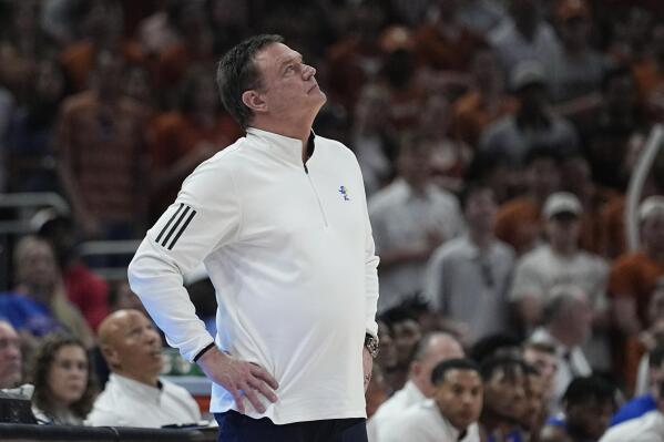 Kansas head coach Bill Self watches a replay during the second half of an NCAA college basketball game against Texas in Austin, Texas, Saturday, March 4, 2023. (AP Photo/Eric Gay)