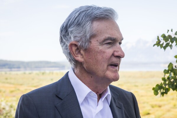 FILE Federal Reserve Chairman Jerome Powell takes a break during the Jackson Hole Economic Symposium near Moran in Grand Teton National Park, Wyo., Aug. 25, 2023. (AP Photo/Amber Baesler)