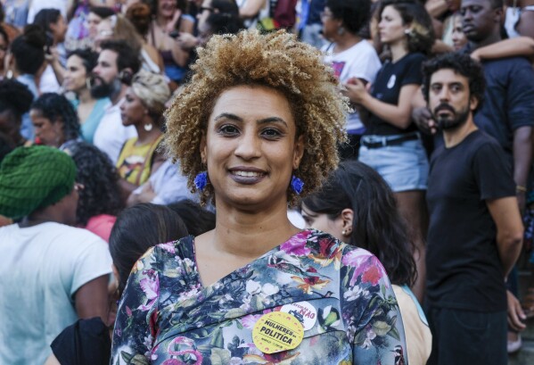 FILE - In this Jan. 9, 2018 file photo, Rio de Janeiro Councilwoman Marielle Franco smiles for a photo in Cinelandia square. Brazil’s federal police arrested on Sunday, March 24, 2024 the men suspected of ordering Franco's killing in 2018, a long-awaited step after years of society clamoring for justice. (AP Photo/Ellis Rua, File)