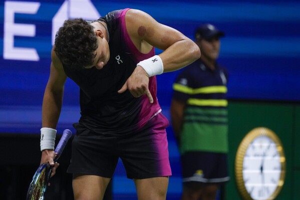 Ben Shelton, of the United States, reacts after defeating Frances Tiafoe, of the United States, during the quarterfinals of the U.S. Open tennis championships, Wednesday, Sept. 6, 2023, in New York. (AP Photo/Charles Krupa)