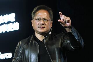 FILE - In this Tuesday, May 30, 2017 file photo, Nvidia CEO Jensen Huang delivers a speech about AI and gaming during the Computex Taipei exhibition at the world trade center in Taipei, Taiwan. Computer graphics chip company Nvidia said it plans to buy Britain's Arm Holdings for $40 billion, in a merger of two leading chipmakers. Santa Clara, California-based Nvidia and Arm's parent company, Japanese technology giant SoftBank, announced the deal Sunday, Sept. 13, 2020. (AP Photo/Chiang Ying-ying, File)