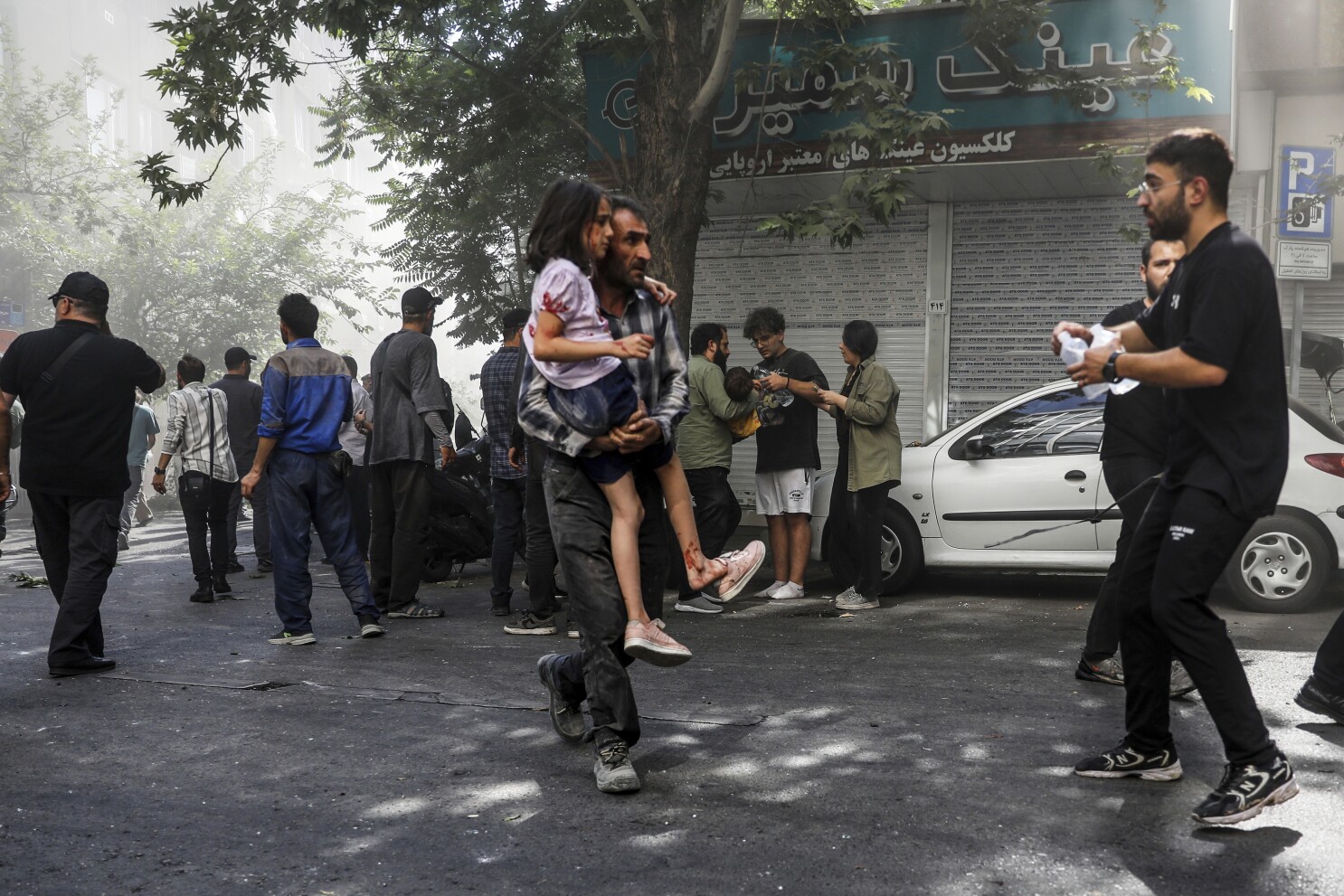 Israel and Iran trade strikes for a third day and threaten more to come