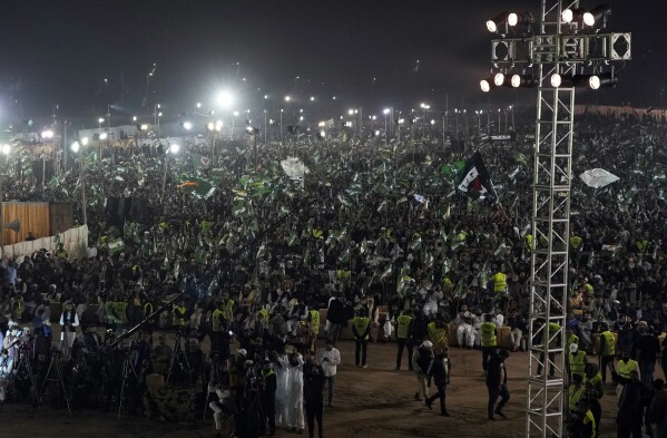 Supporters of the Pakistani religious group Tehreek-e-Labbaik Pakistan (TLP) attend an election campaign rally in Karachi, Pakistan, Sunday, Feb. 4, 2024. (AP Photo/Fareed Khan)