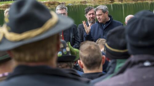 Bavaria's governor Markus Soeder gestures as he attends a farmers meeting in Oberaudorf, Germany, Wednesday, April 26, 2023 because of the sheep ripping by a bear in the mountain region near the border. Officials in Germany’s southern state of Bavaria said Wednesday that they want to make it easier to shoot wolves after farmers complained that their livestock on Alpine pastures are being preyed upon. (Peter Kneffel/dpa via AP)