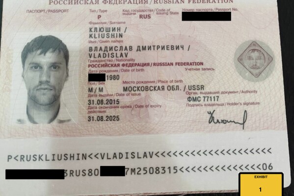 FILE - This image provided by the U.S. Attorney's Office, shows a Russian passport of Vladislav Klyushin, part of the government evidence entered into the record as exhibits in Klyushin's trial. Klyushin was sentenced Thursday, Sept. 7, 2023, to nine years in prison for his role in a nearly $100 million stock market cheating scheme that relied on secret earnings information stolen through the hacking of U.S. computer networks. ( U.S. Attorney's Office via AP)