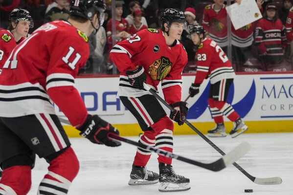Chicago Blackhawks left wing Lukas Reichel warms up before an NHL hockey game against the Nashville Predators, Tuesday, Dec. 5, 2023, in Chicago. (APPhoto/Erin Hooley)
