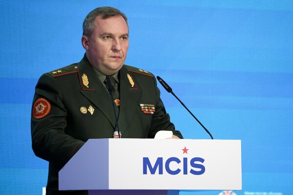 FILE - Belarusian Defense Minister Viktor Khrenin delivers his speech at the International Military Forum Army-2023 in the Patriot Park near Moscow in Moscow, Russia, Tuesday, Aug. 15, 2023. The defense minister of Belarus said Tuesday that the country closely allied with Russia will put forth a new military doctrine that provides for the use of nuclear weapons for the first time. (AP Photo/Alexander Zemlianichenko, File)