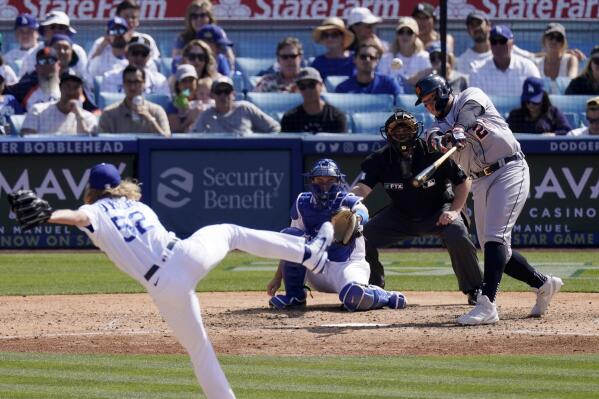 Detroit Tigers' Miguel Cabrera, right, hits a two-run home run as Los Angeles Dodgers relief pitcher Phil Bickford, left, watches along with catcher Will Smith and home plate umpire Brian Knight during the eighth inning of a baseball game Sunday, May 1, 2022, in Los Angeles. (AP Photo/Mark J. Terrill)