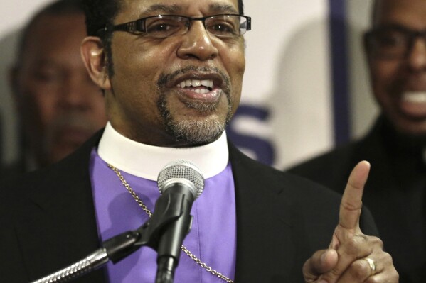 FILE - Bishop Carlton Pearson speaks at a news conference accompanied by several other clergy members, April 4, 2013, in Chicago. Before his peers would label him a heretic, the late Bishop Carlton D. Pearson was once one of the best known preachers in the nation. In the 2000s. Pearson underwent a cataclysmic theological shift that altered the course of his life 鈥� and his legacy among the canon of American Christian leaders. (AP Photo/M. Spencer Green, file)